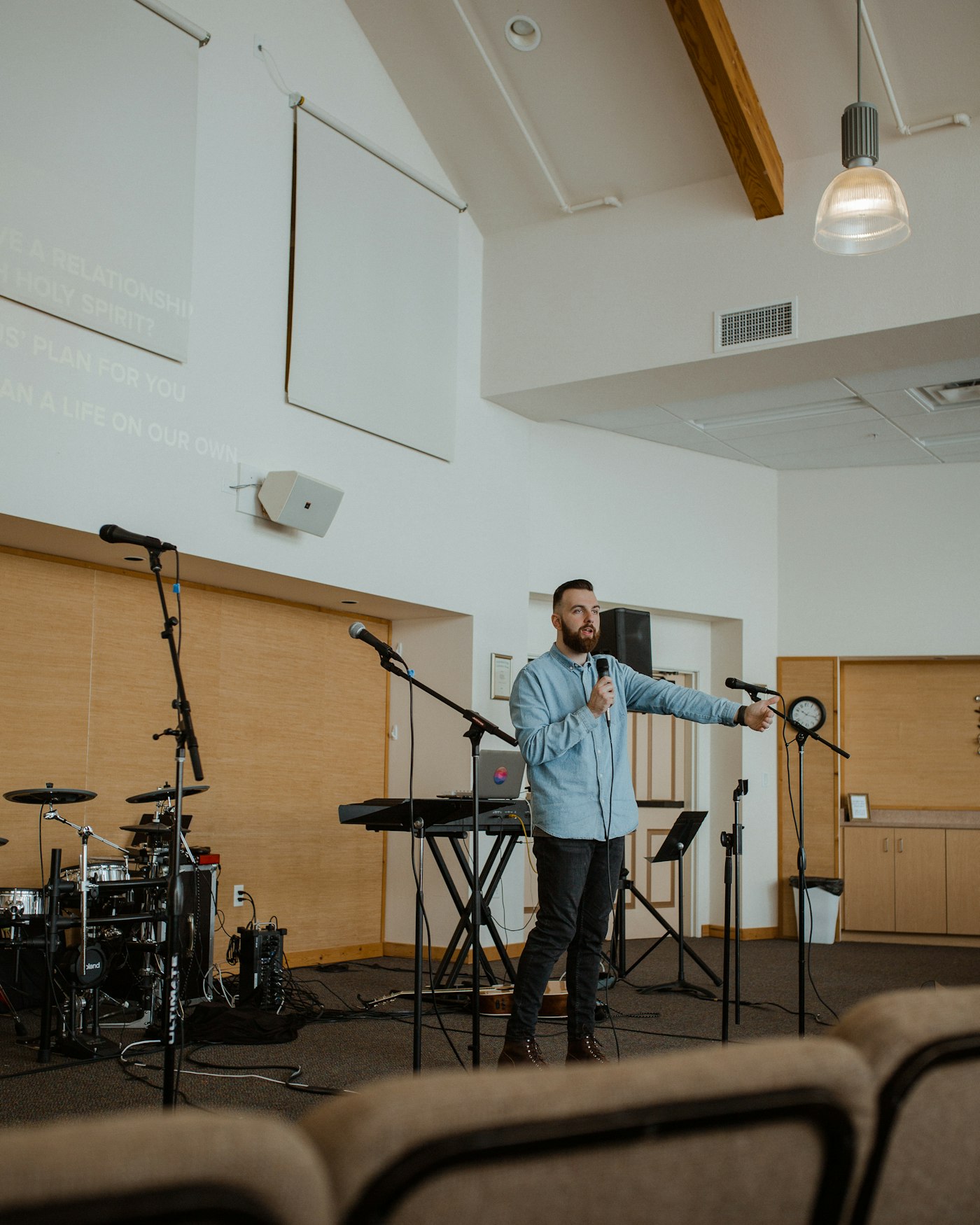 A church leader teaching mid-service, fully present with the people in front of them